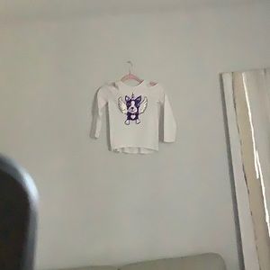 Dog with wings white shirt